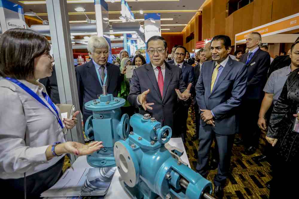 Finance Minister Lim Guan Eng visits a booth after launching the 17th Asian Oil, Gas and Petrochemical Engineering 2019 Exhibition in Kuala Lumpur June 18, 2019. u00e2u20acu2022 Picture by Firdaus Latif