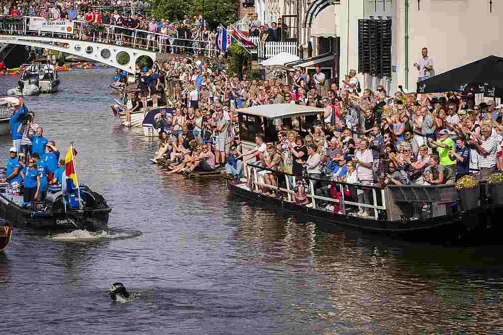 Dutch Former World Champion Maarten van der Weijden passing Dokkum during his second attempt to swim along the Elfstedentocht. u00e2u20acu201d AFP pic