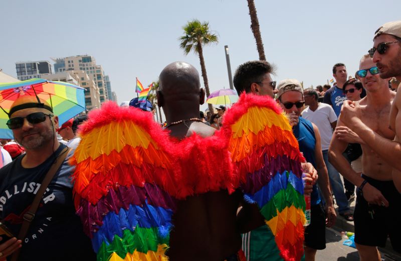 Revellers celebrate along a seaside avenue in Tel Aviv during the 2018 edition of the Israeli city's annual Gay Pride parade on June 8, 2018. u00e2u20acu2022 AFP pic