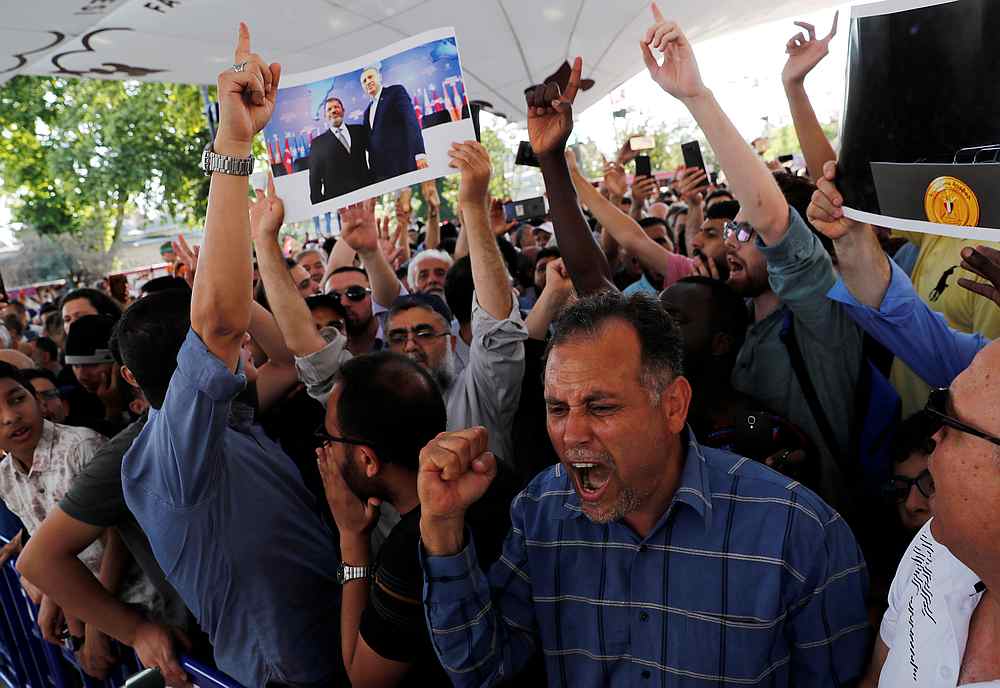 People shout slogans during a symbolic funeral prayer for the former Egyptian president Mohamed Mursi at the courtyard of Fatih Mosque in Istanbul, Turkey June 18, 2019. u00e2u20acu201d Reuters pic