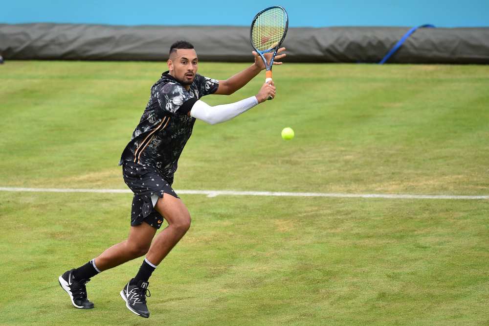 Australia's Nick Kyrgios returns against Spain's Roberto Carballes Baena during their men's singles round of 32 tennis match at Queen's Club in west London June 20, 2019. u00e2u20acu2022 AFP pic