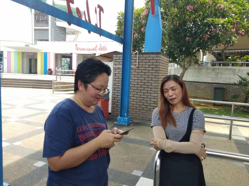 Choon Lee Yau (right) said with six months to go, frontliners like her have not been briefed about the island’s impending duty-free status. — Picture by Sylvia Looi