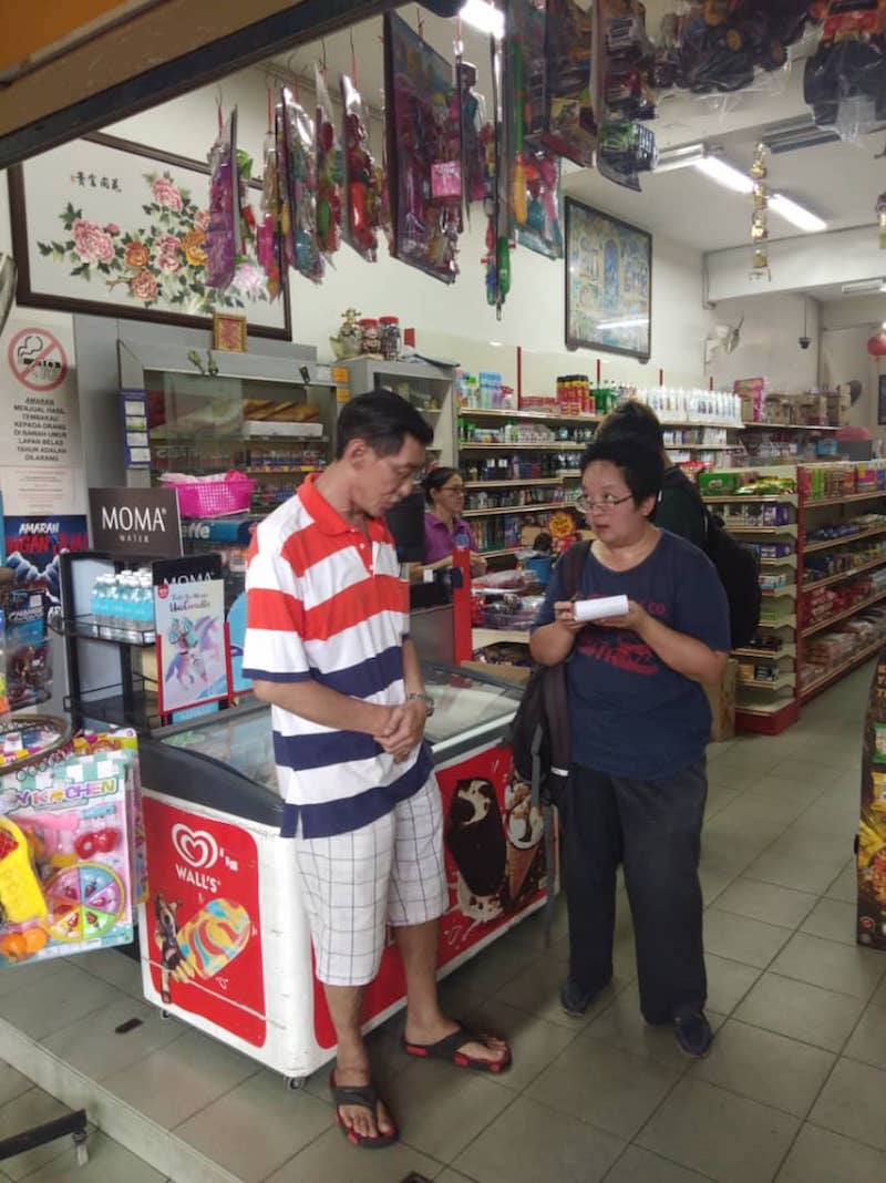 Mini market operator Beh Seng Aik, 53, said people are still in the dark over the matter. — Picture by Sylvia Looi