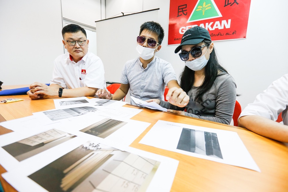 The woman and her husband describe her ordeal of being filmed while showering in a hotel gym during a press conference in George Town June 20, 2019. u00e2u20acu201d Picture by Sayuti Zainudin