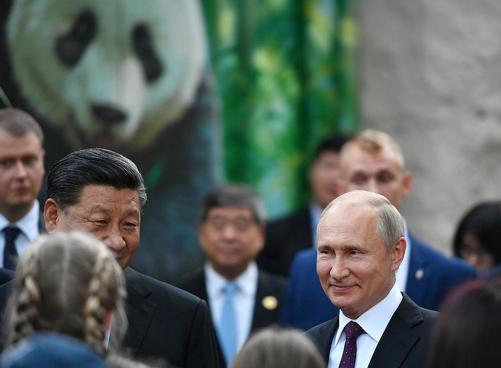 Russian President Vladimir Putin (right) and Chinese President Xi Jinping visit the Moscow Zoo, which received a pair of giant pandas from China June 5, 2019. u00e2u20acu201d Sputnik/Alexander Vilf/Kremlin pic via Reuters