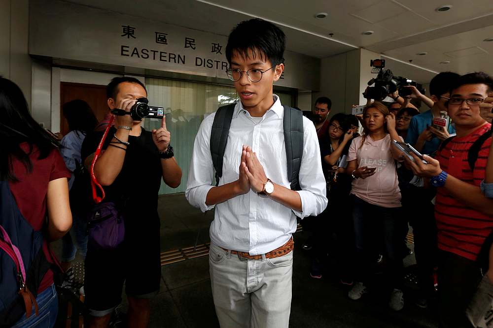 Ray Wong, one of the leaders of localist group Hong Kong Indigenous, leaves a court in Hong Kong, China, September 23, 2016, with nine other defendants after pleading not quilty on rioting charges. u00e2u20acu201d Reuters pic
