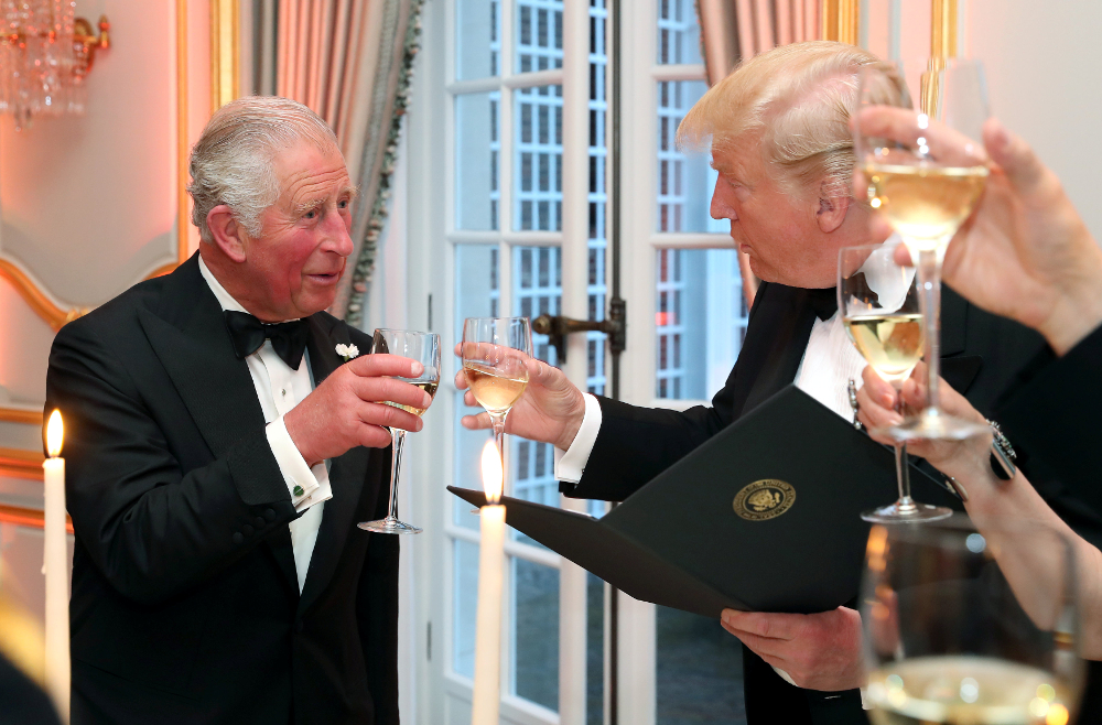 US President Donald Trump and Prince Charles, Prince of Wales, raise their glasses at a dinner at Winfield House, during Trumpu00e2u20acu2122s state visit in London June 4, 2019. u00e2u20acu201d Picture by Chris Jackson/Pool via Reuter 
