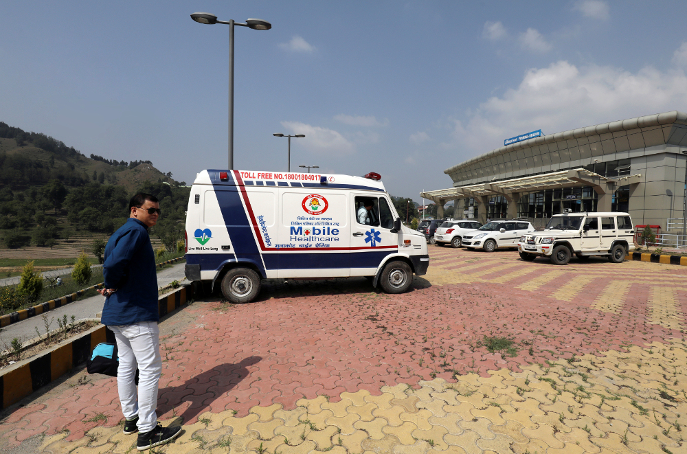 An ambulance is parked outside an airport where the bodies of missing climbers are expected to arrive in Pithoragarh town, in the Himalayan state of Uttarakhand June 5, 2019. u00e2u20acu201d Reuters pic