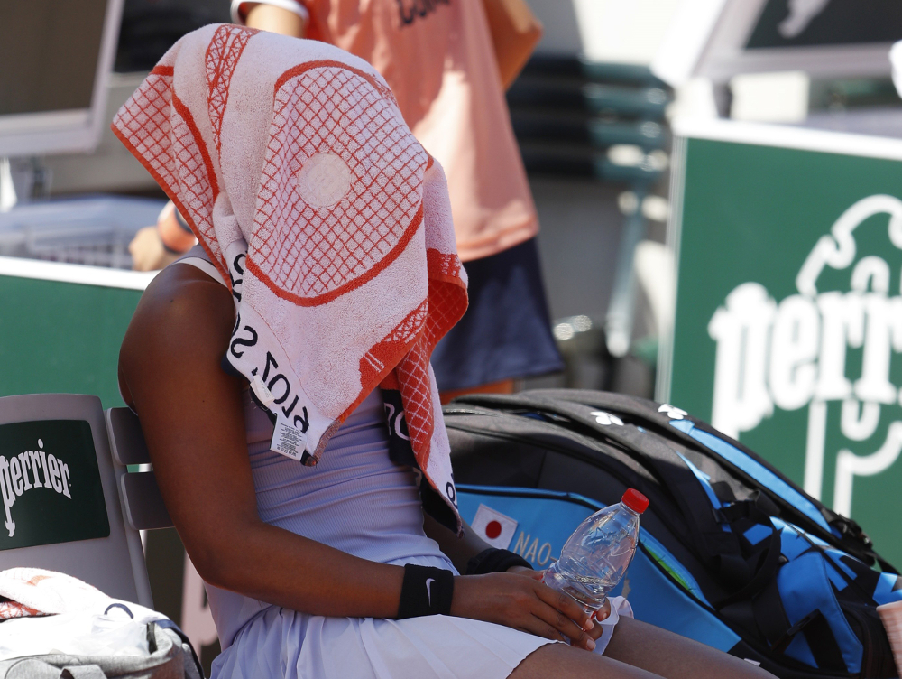 Japanu00e2u20acu2122s Naomi Osaka during a break during her French Open third round match against Katerina Siniakova of the Czech Republic at Roland Garros, Paris June 1, 2019. u00e2u20acu201d Reuters pic