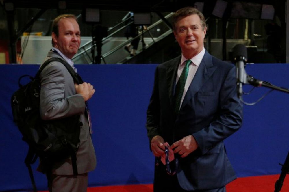 Paul Manafort (right), campaign manager to Republican Presidential Candidate Donald Trump, and his assistant Rick Gates stand on the floor of the Republican National Convention in Cleveland, Ohio, US July 17, 2016. u00e2u20acu201d Reuters pic