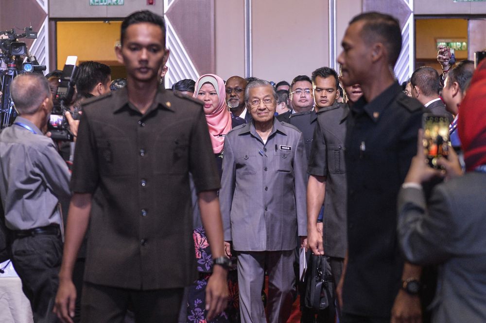 Prime Minister Tun Dr Mahathir Mohammad arrives for the launch of the Rural Development Policy at the Putrajaya International Convention Centre June 27, 2019. u00e2u20acu201d Picture by Miera Zulyana