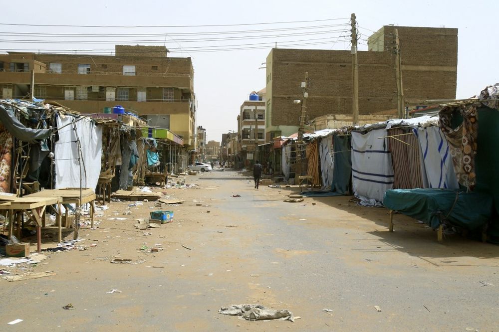 A Sudanese man walks by closed shops at the Omdurman market, in Khartoum's twin city on June 9, 2019. u00e2u20acu201d AFP pic