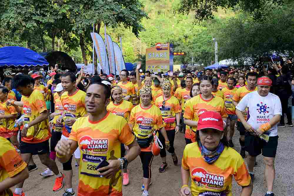 Participants run in a marathon near the Tham Luang cave, where 12 boys from the 'Wild Boars' football team and their coach were trapped last year. u00e2u20acu201d AFP picn