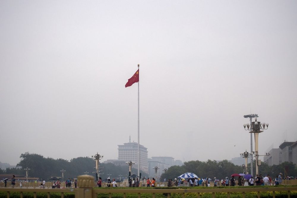 The Chinese flag is seen on Tiananmen Square in Beijing on June 4, 2019. China marked 30 years since the deadly Tiananmen crackdown on Tuesday with a wall of silence and extra security ahead of the politically sensitive anniversary. u00e2u20acu201d AFP pic