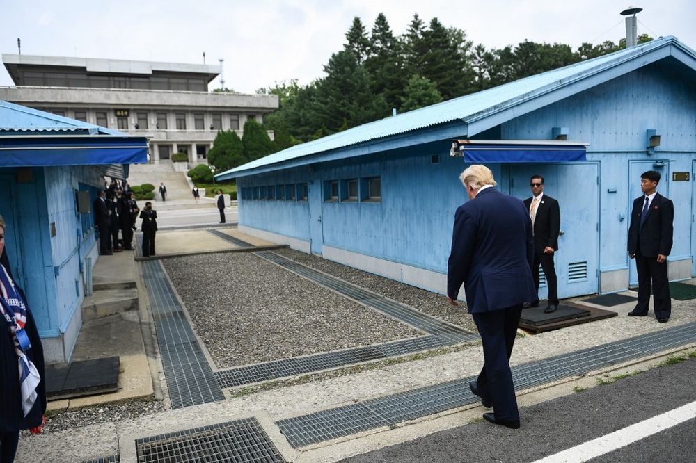 US President Donald Trump walks towards the Military Demarcation Line that divides North and South Korea, for a meeting with North Korea's leader Kim Jong-un, in the Joint Security Area of Panmunjom in the DMZ, June 30, 2019. u00e2u20acu201d AFP pic