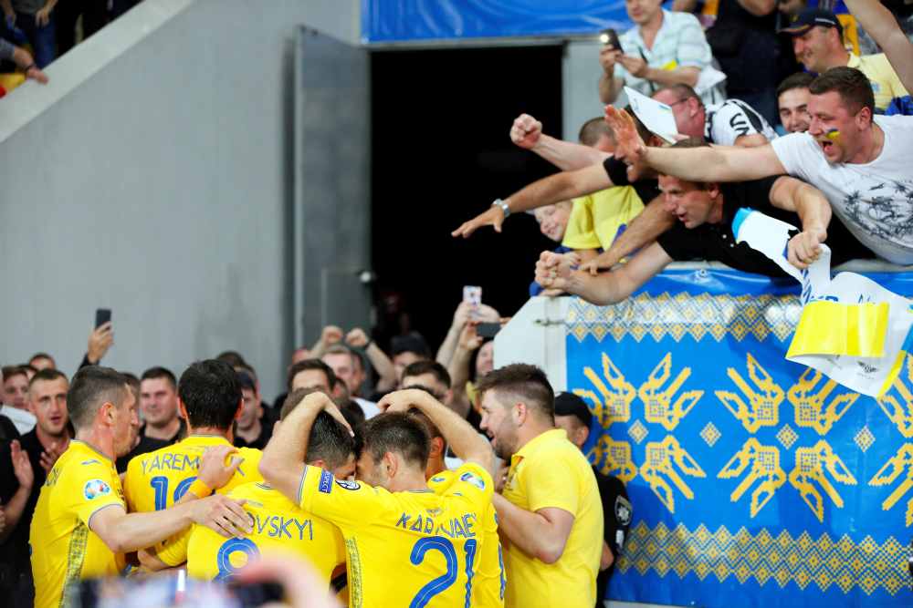 Fans celebrate with Ukrainian players after the match against Serbia June 7, 2019. u00e2u20acu2022 Reuters pic