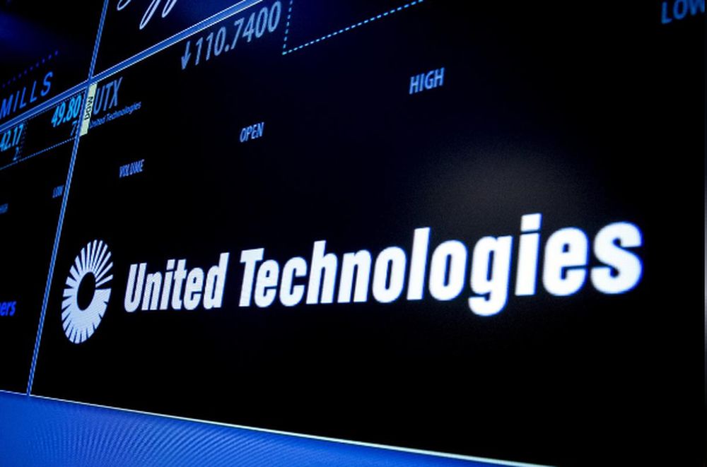 The ticker symbol for United Technologies is displayed on a screen on the floor of the New York Stock Exchange July 20, 2015. u00e2u20acu201d Reuters pic