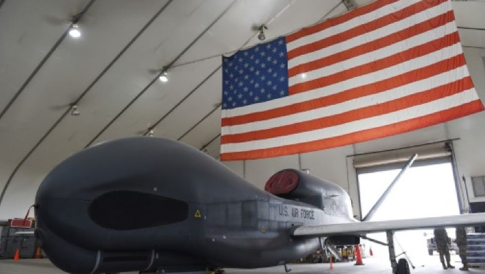 In this image released by the US Air Force, a RQ-4 Global Hawk unmanned surveillance drone sits in a hangar on February 17, 2019, at Al Dhafra Air Base, United Arab Emirates. u00e2u20acu201d US AIR FORCE/AFP pic