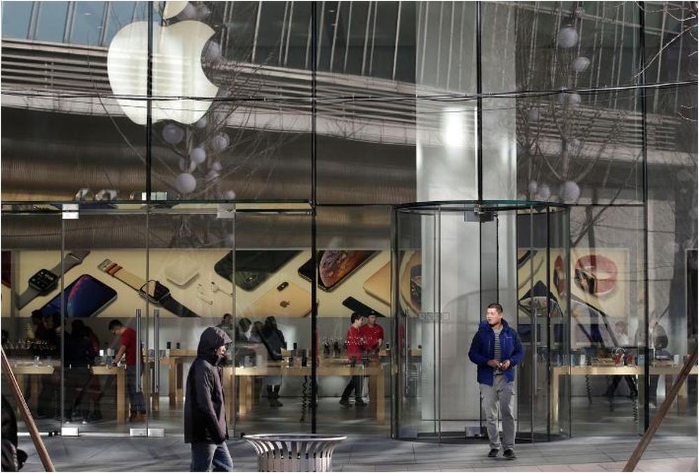 A man walks out of an Apple store in Beijing, China December 14, 2018. u00e2u20acu201d Reuters pic