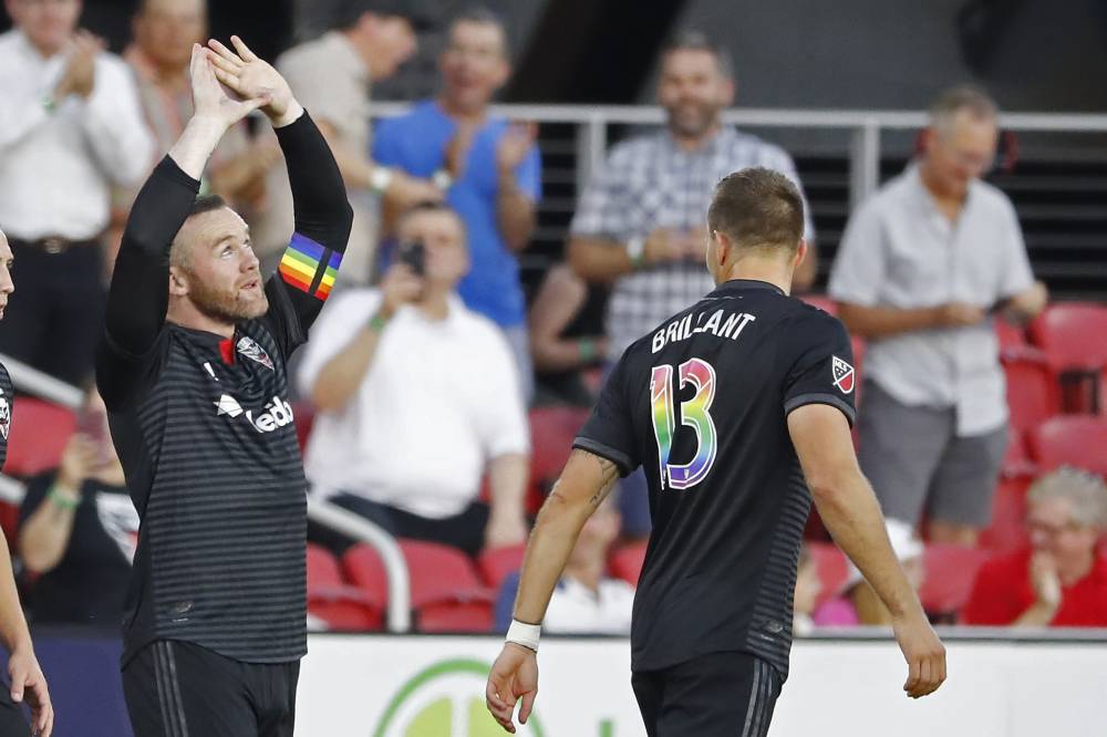 DC United forward Wayne Rooney (9) celebrates after scoring a goal from beyond midfield against Orlando City SC in the first half at Audi Field in Washington June 26, 2019. u00e2u20acu2022 Picture by Geoff Burke-USA TODAY Sports via Reuters