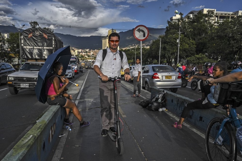 A man rides electric scooter in Medellin, Antioquia department, Colombia, July 2, 2019. u00e2u20acu201d AFP pic