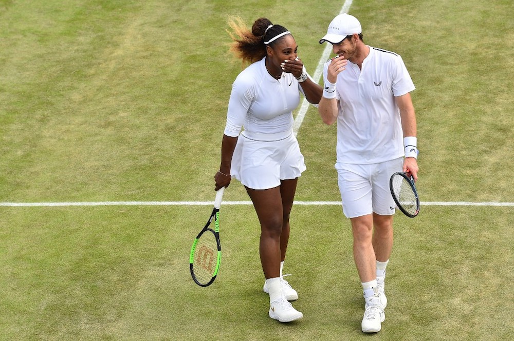 Britainu00e2u20acu2122s Andy Murray and US player Serena Williams talk as they play Brazilu00e2u20acu2122s Bruno Soares and USu00e2u20acu2122 Nicole Melichar during their mixed doubles third-round match at Wimbledon in London July 10, 2019. u00e2u20acu201d AFP pic