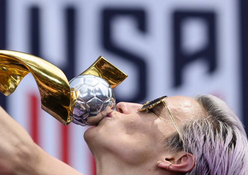 USA womenu00e2u20acu2122s football player Megan Rapinoe kisses the trophy in front of City Hall after the ticker tape parade for the womenu00e2u20acu2122s World Cup champions in New York July 10, 2019. u00e2u20acu201d AFP pic
