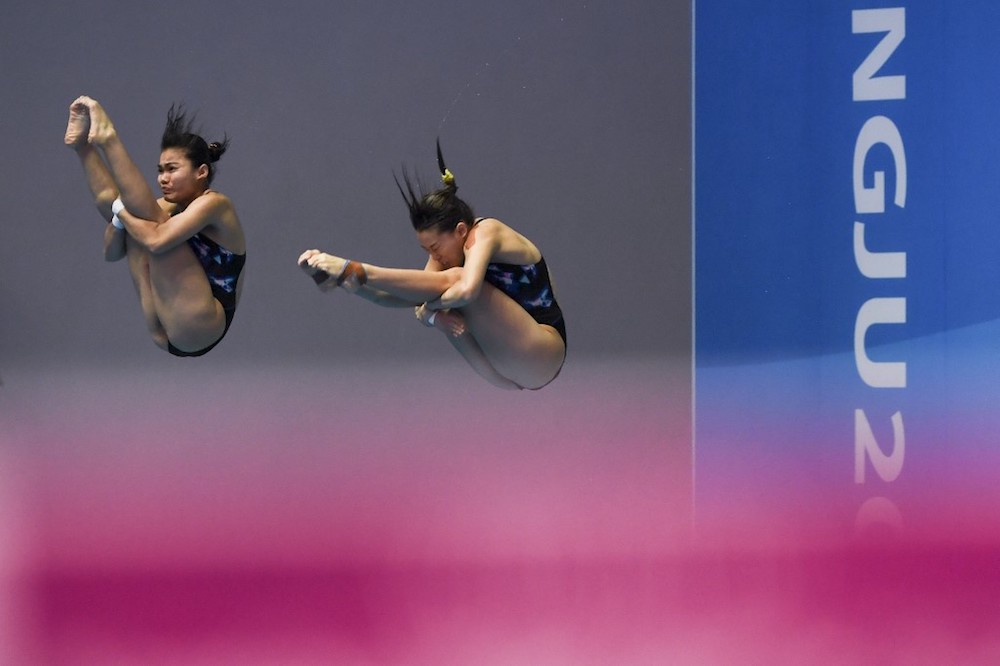 Malaysiau00e2u20acu2122s Wendy Ng and Nur Dhabitah Sabri compete in the womenu00e2u20acu2122s synchronised 3m springboard diving event during the 2019 World Championships in Gwangju July 15, 2019. u00e2u20acu201d AFP pic