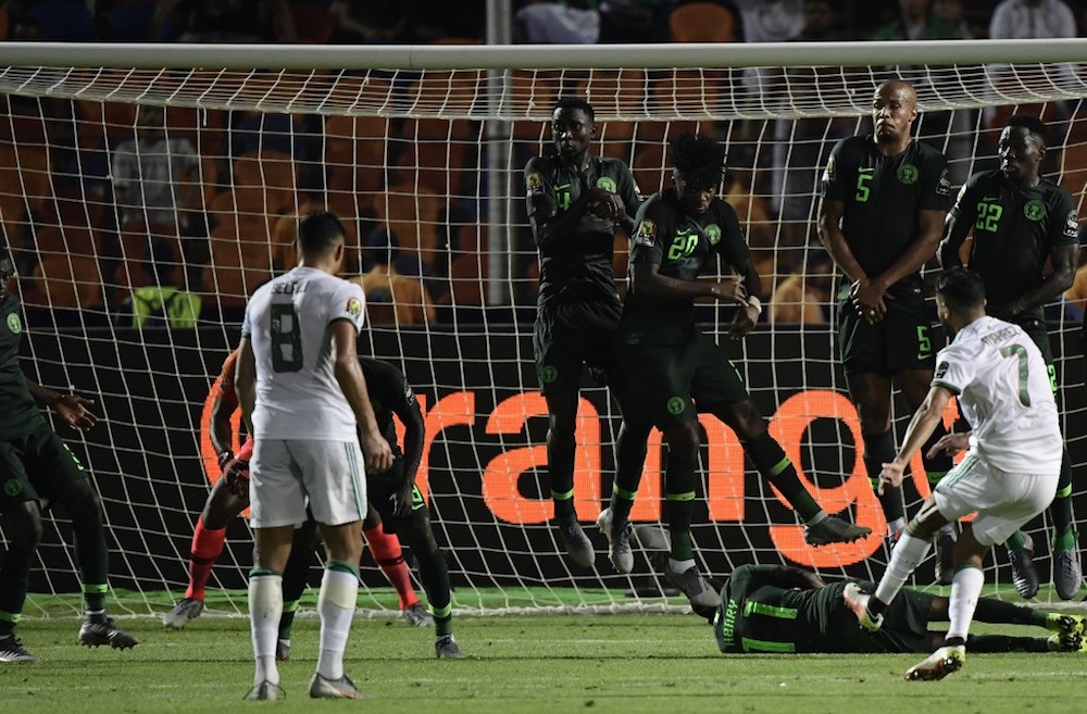 Algeriau00e2u20acu2122s Riyad Mahrez scores a free-kick during the 2019 Africa Cup of Nations (CAN) semi-final with Nigeria in Cairo July 14, 2019. u00e2u20acu201d AFP pic