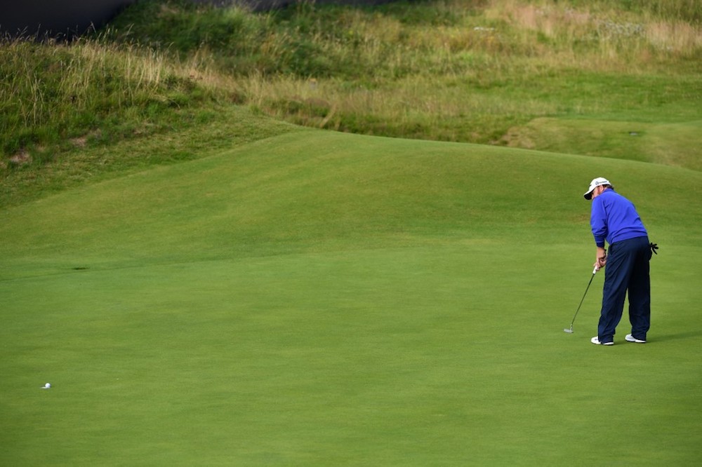 US golfer JB Holmes putts on the 18th hole during the first round of the British Open at Royal Portrush golf club in Northern Ireland July 18, 2019. u00e2u20acu201d AFP pic