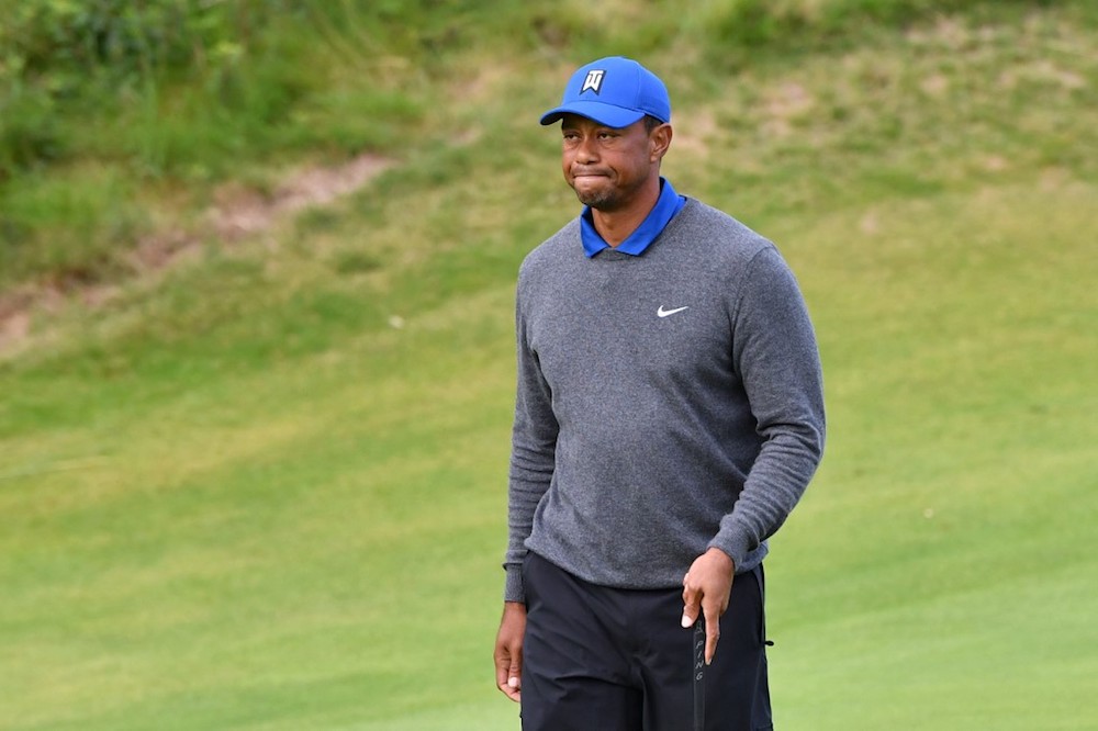 US golfer Tiger Woods reacts after missing a putt at the 18th hole during the first round of the British Open at Royal Portrush golf club in Northern Ireland July 18, 2019. u00e2u20acu201d AFP pic