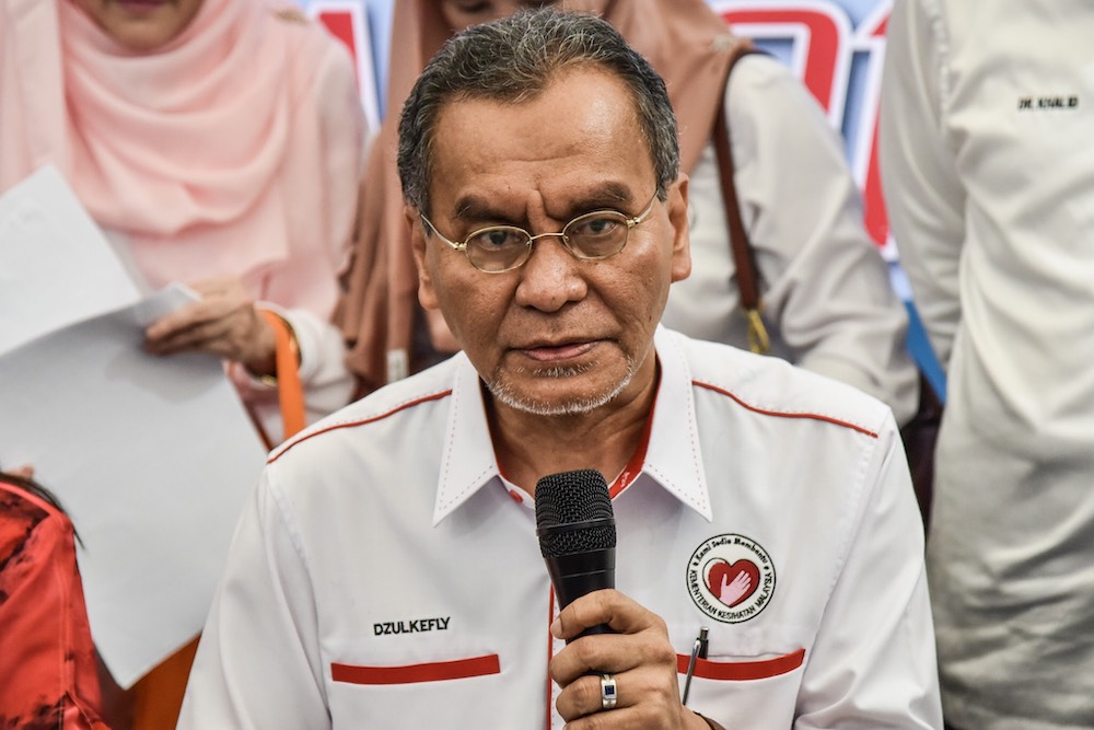 Health Minister Datuk Seri Dzulkefly Ahmad speaks to the media after launching an operation to release Wolbachia-infected mosquitoes at the Sri Rakyat apartment in Bukit Jalil, July 7, 2019. u00e2u20acu201d Picture by Hari Anggara