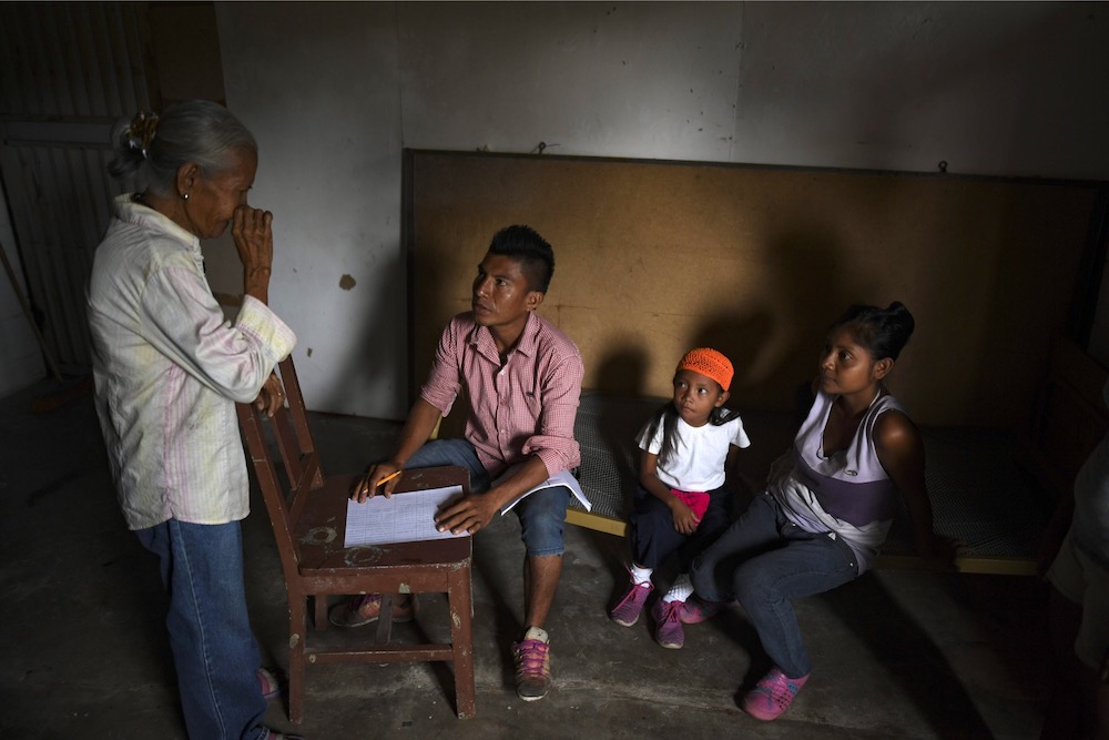Yukpa natives wait for their turn to have a malaria test done at an improvised laboratory of Los Angeles del Tukuko mission, near Machiques, Zulia state, Venezuela June 12, 2019. u00e2u20acu201d AFP pic