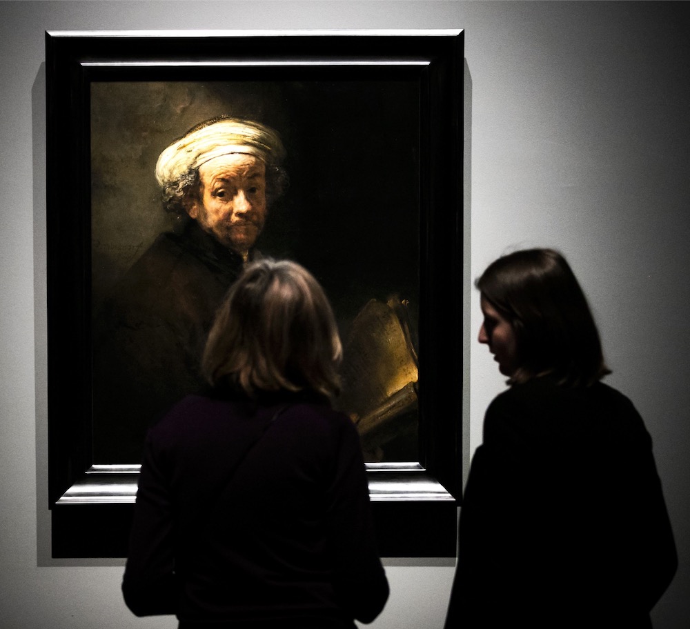 Women look at u00e2u20acu02dcSelf Portrait as the Apostle Paul, a painting by late Dutch painter Rembrandt displayed at the Rijksmuseum in Amsterdam February 13, 2019 in Amsterdam. u00e2u20acu201d AFP pic