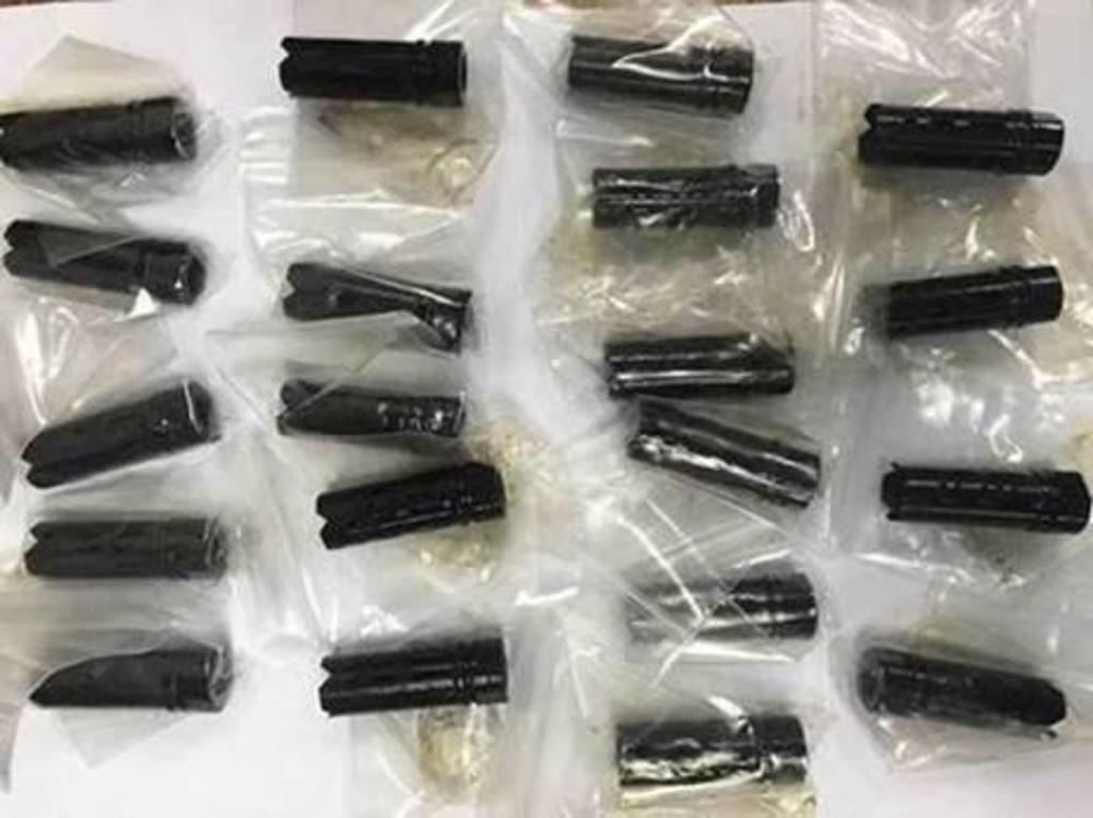 Twenty items suspected to be gun parts that were uncovered by the Immigration and Checkpoints Authority from a parcel. u00e2u20acu201d Picture courtesy of Immigration and Checkpoints Authority/Facebook via TODAY