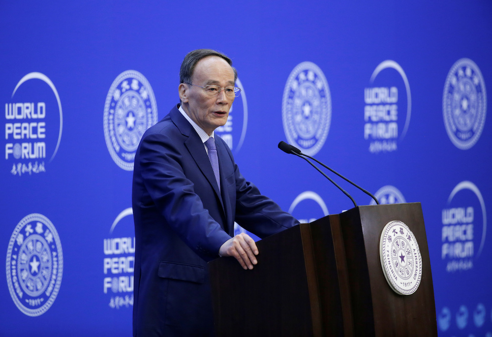 Chinese Vice President Wang Qishan delivers a speech at the opening of World Peace Forum at Tsinghua University, in Beijing July 8, 2019. u00e2u20acu201d Reuters pic