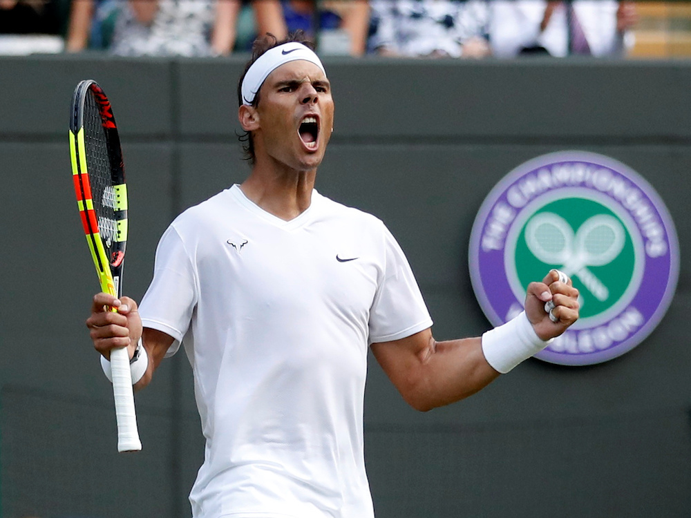 Spain's Rafael Nadal celebrates after winning his quarter final match against Sam Querrey of the US, July 10, 2019. u00e2u20acu201d Reuters pic