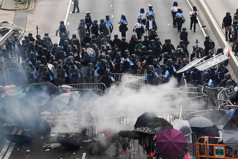 In this file photo taken on June 12, 2019, police clash with protesters during a rally against a controversial extradition law proposal outside the government headquarters in Hong Kong. u00e2u20acu201d AFP pic