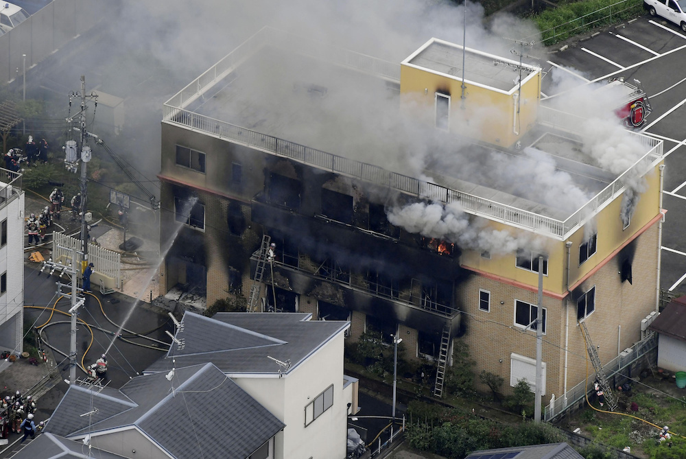 An aerial view shows firefighters battling fires at a three-storey studio of Kyoto Animation Co in Kyoto in this photo taken by Kyodo, July 18, 2019. u00e2u20acu201d Kyodo handout via Reuters