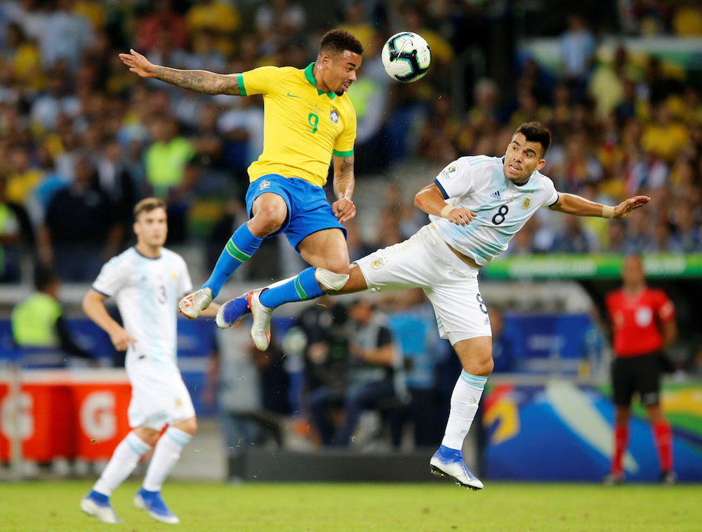 Brazilu00e2u20acu2122s Gabriel Jesus in action with Argentinau00e2u20acu2122s Marcos Acuna during their Copa America 2019 semi-final match at the Mineirao Stadium in Belo Horizonte, Brazil July 2, 2019. u00e2u20acu201d Reuters pic