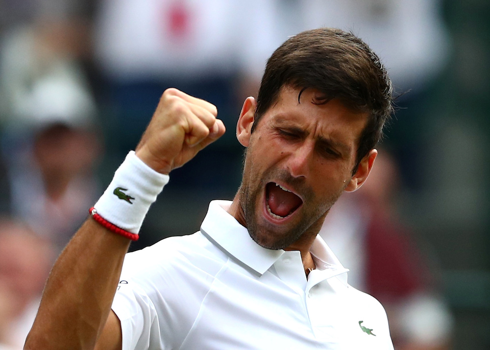 Serbia’s Novak Djokovic celebrates winning his third-round match against Poland’s Hubert Hurkacz during Wimbledon in London July 5, 2019. — Reuters pic