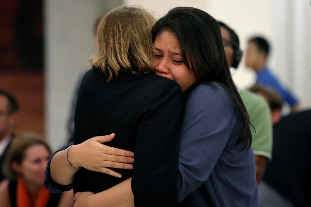 A family member reacts during a commemoration ceremony in memory of the victims of the Malaysia Airlines flight MH17 plane crash on the fifth anniversary of the accident, at the Australian High Commission in Kuala Lumpur July 17, 2019. u00e2u20acu201d Reuters pic