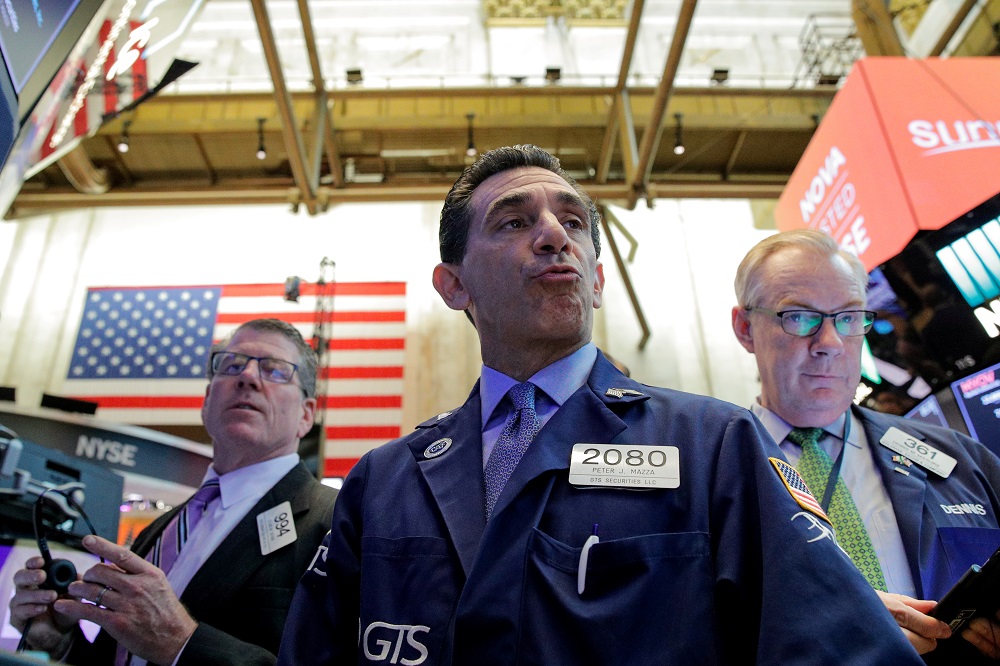 Traders work on the floor of the New York Stock Exchange July 25, 2019. u00e2u20acu201d Reuters pic