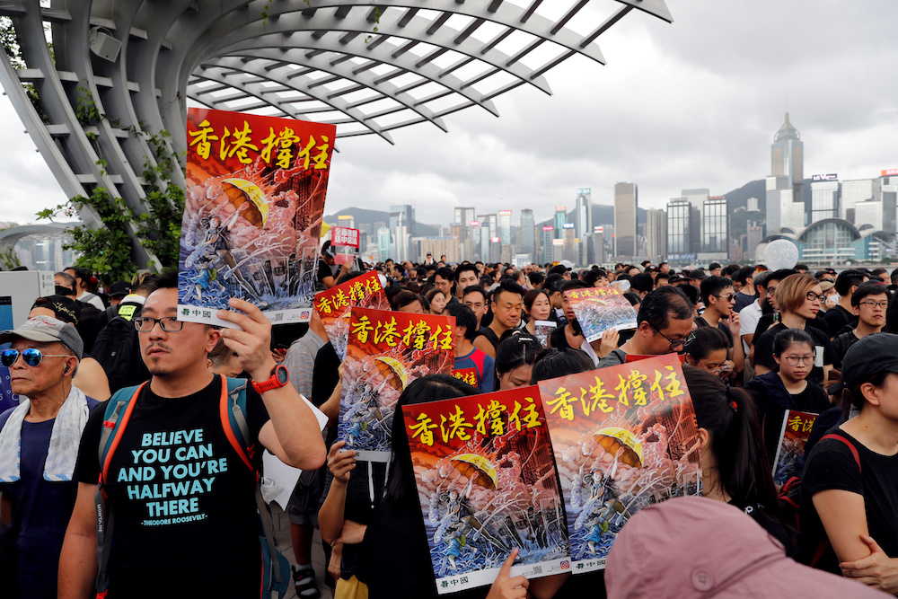 Anti-extradition bill protesters march to West Kowloon Express Rail Link Station at Hong Kong's tourism district Tsim Sha Tsui July 7, 2019. u00e2u20acu201d Reuters picnn