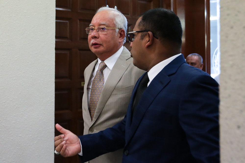 Datuk Seri Najib Razak arrives at the Kuala Lumpur High Court July 8 2019. u00e2u20acu201d Picture by Ahmad Zamzahuri