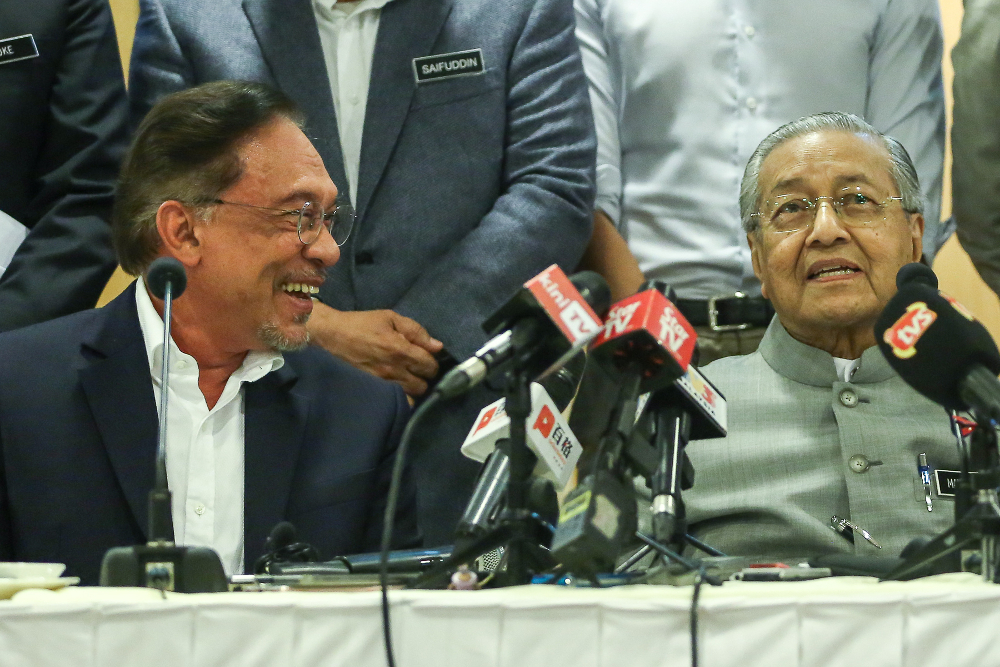 Prime Minister Tun Dr Mahathir Mohamad (right) and PKR president Datuk Seri Anwar Ibrahim after a press conference at Yayasan Kepimpinan Perdana in Putrajaya July 8, 2019. u00e2u20acu201d Picture by Yusof Mat Isa