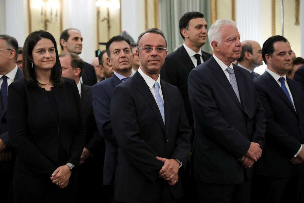 Newly appointed Greek Finance Minister Christos Staikouras (centre) attends a swearing-in ceremony for members of the government at the Presidential Palace in Athens July 9. 2019. u00e2u20acu201d Reuters picnn