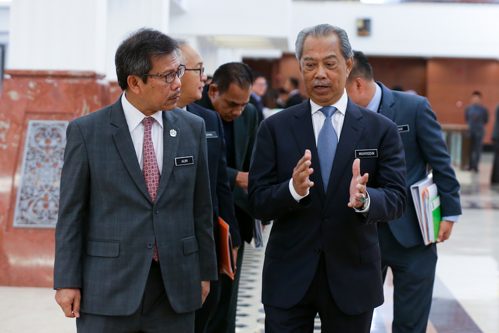 Tan Sri Muhyiddin Yassin arrives at the Parliament building in Kuala Lumpur July 10, 2019. u00e2u20acu201d Picture by Ahmad Zamzahuri 