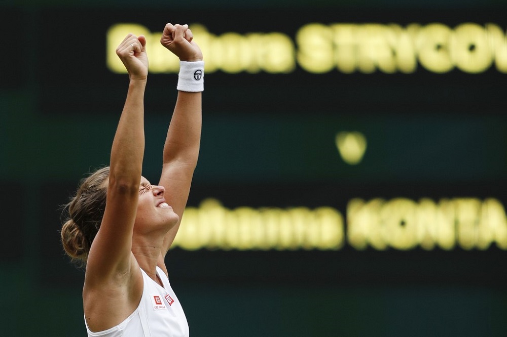 Barbora Strycova celebrates beating Johanna Konta during their womenu00e2u20acu2122s singles quarter-final match on day eight of the 2019 Wimbledon Championships in London July 9, 2019. u00e2u20acu201d AFP pic