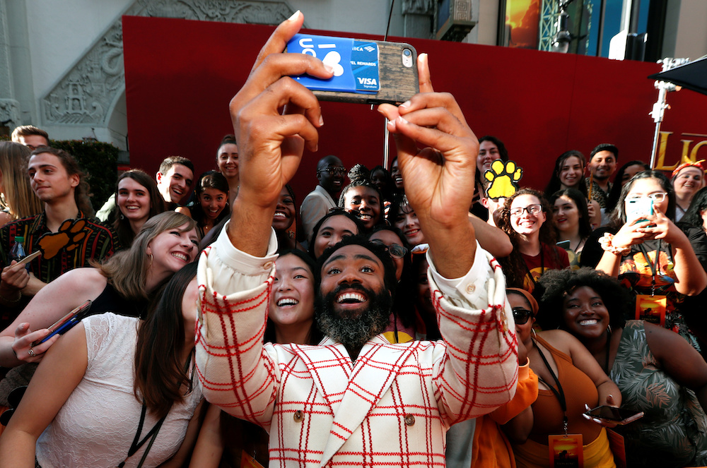 Cast member Donald Glover poses for a photo with fans during the World Premiere of ,The Lion King, in Los Angeles July 9, 2019. u00e2u20acu201d Reuters picnn